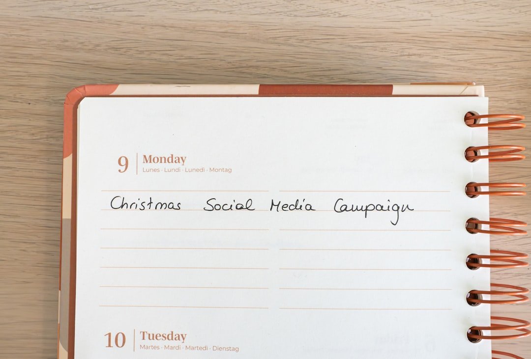 cbd oil benefits - Person recording CBD wellness journey in journal