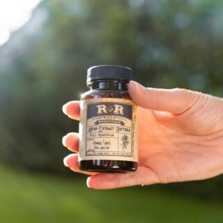 cbd oil benefits - Person incorporating CBD oil into morning wellness routine