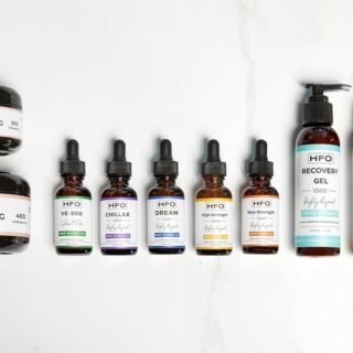 full spectrum vs broad spectrum cbd - A selection of premium CBD products representing both full spectrum and broad spectr...