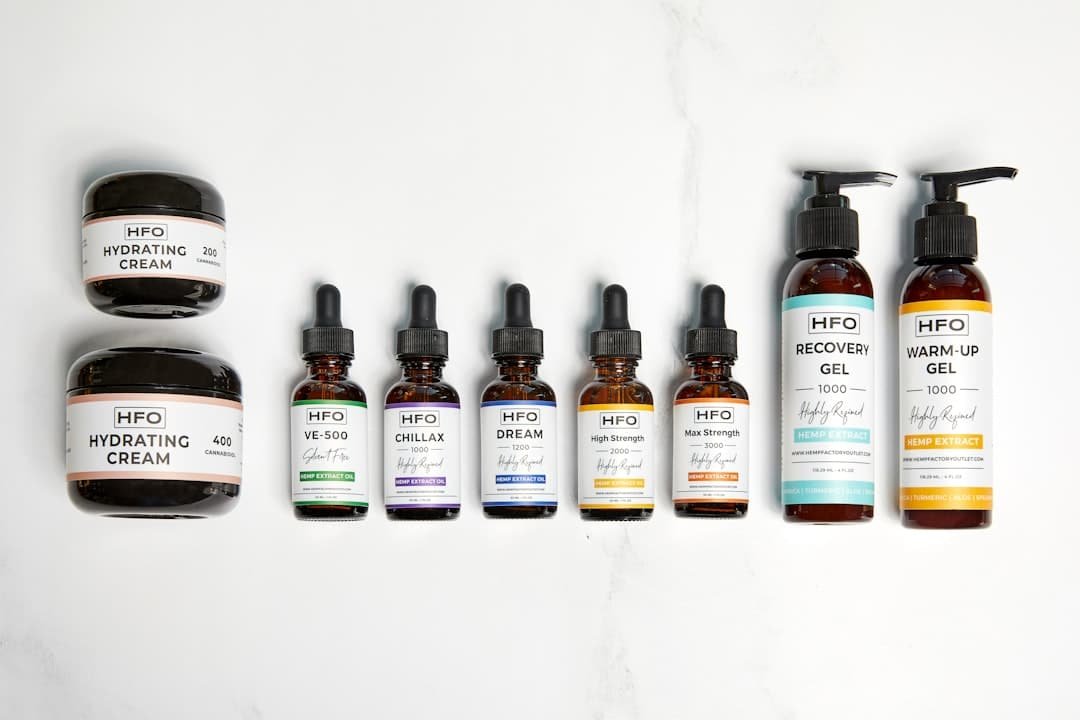 full spectrum vs broad spectrum cbd - A selection of premium CBD products representing both full spectrum and broad spectr...
