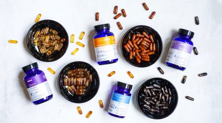 blue and white plastic bottle beside brown round ashtray