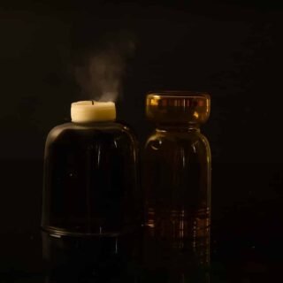 Premium high strength CBD oil bottles arranged with natural hemp leaves, representing quality wellness support