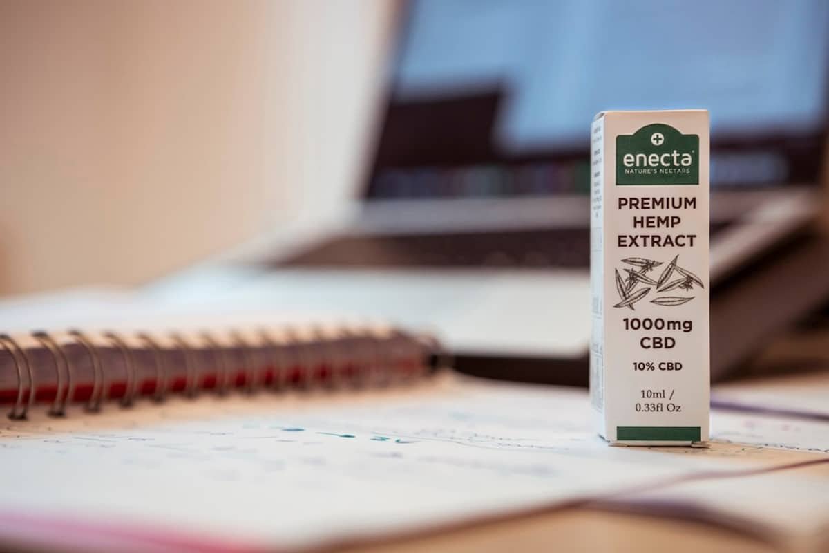 cbd batch numbers uk - A consumer checking a CBD product batch number against its Certificate of Analysis lab report