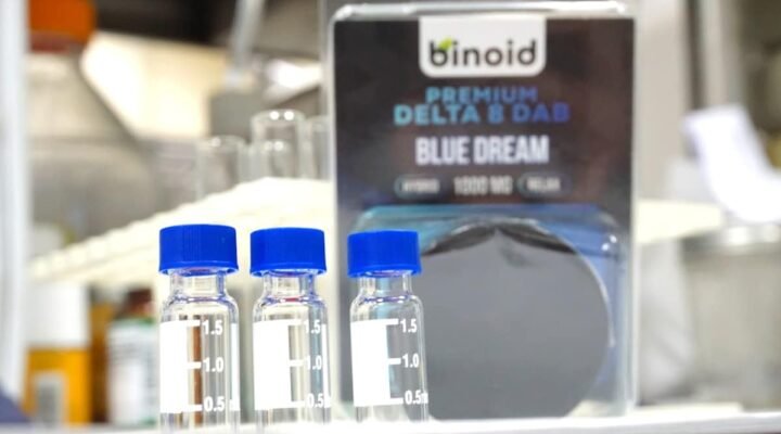 cbd product transparency uk - A certified laboratory analyst reviewing CBD batch test results — the gold standard of produ...