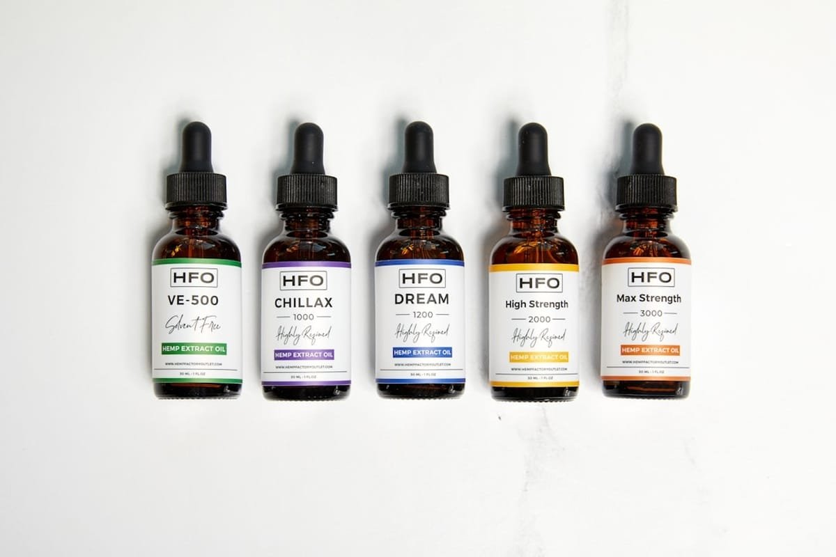 cbd oil flavours uk - A selection of flavoured CBD oil bottles showcasing different taste options for wellness enthusiasts