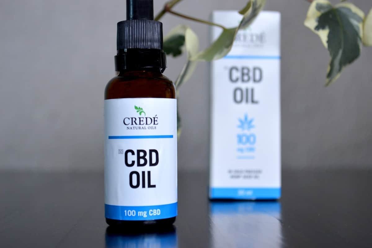 cbd product recall check - A consumer checking CBD product batch details against an official safety database for peace of ...