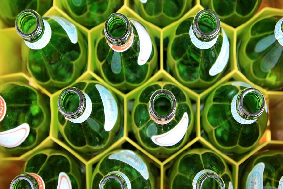recycle cbd packaging - Glass CBD oil bottles ready for recycling after rinsing
