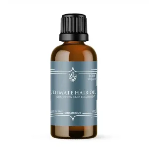 CBD Armour hair oil in an amber glass bottle